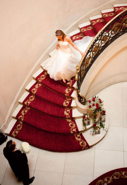 Opulence bride on stairs luton hoo