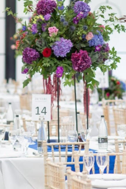 tall floral rich floral centrepiece